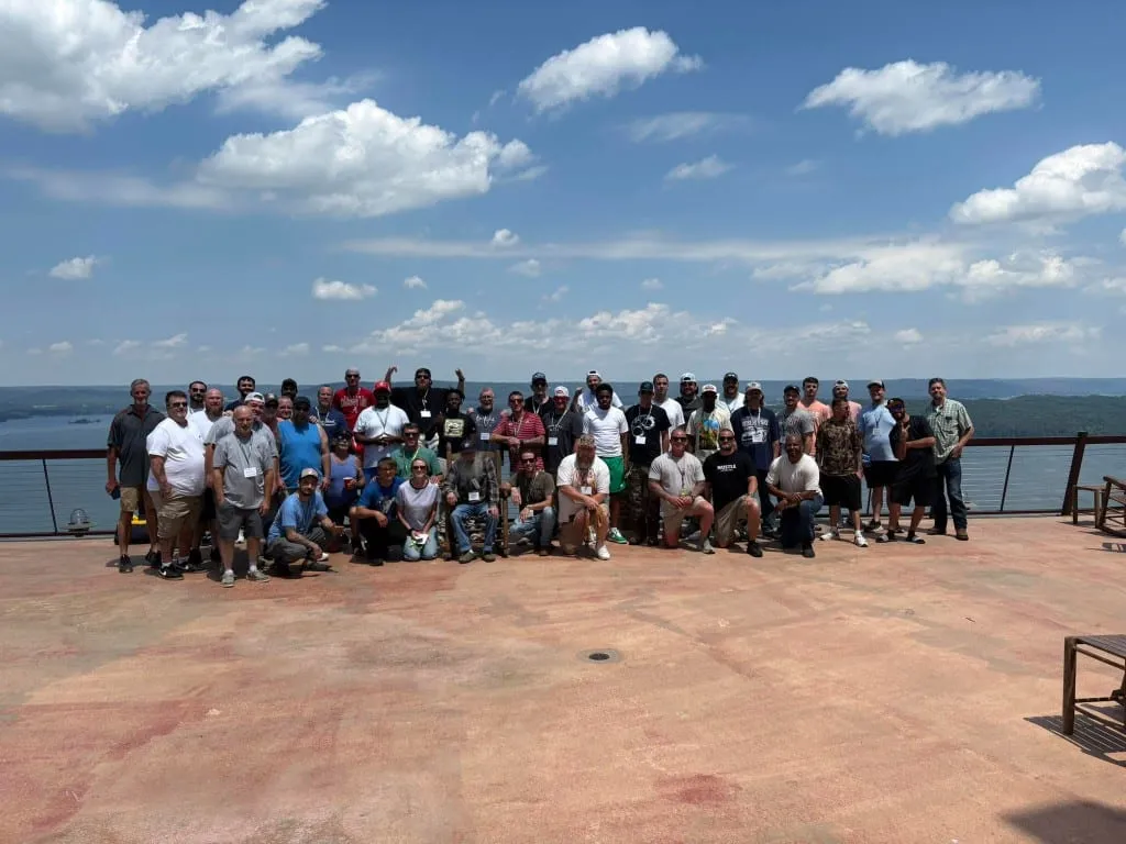 Men in the Living Free Recovery program gathered outdoors near Falkville, Alabama
